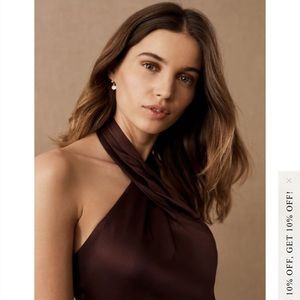 A chic high neck line completes this glamorous maxi dress in sleek Satin.